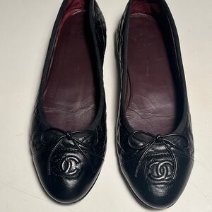 CHANEL Black Quilted Flats with Bow